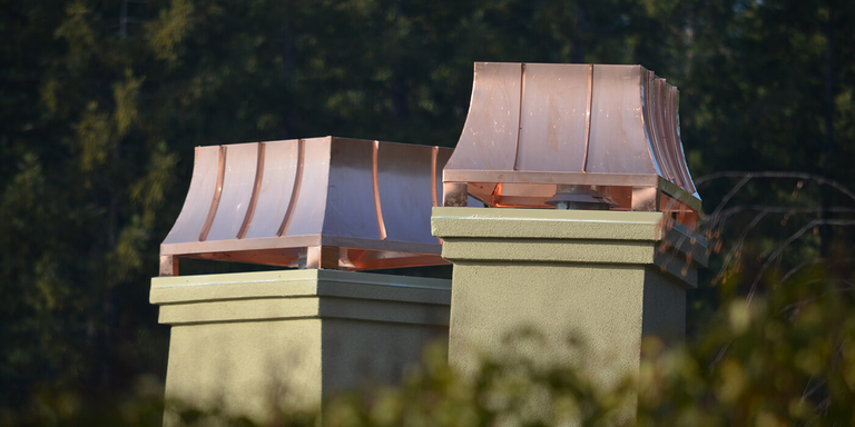 Two copper chimney shrouds from American Chimney Shroud
