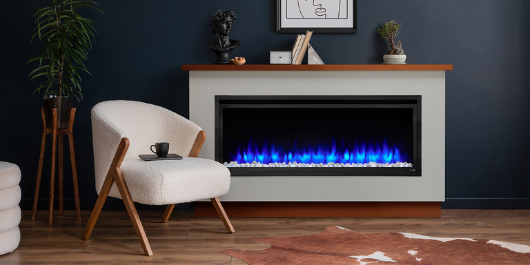 A linear electric fireplace with blue flames, built into a custom enclosure with a mantel