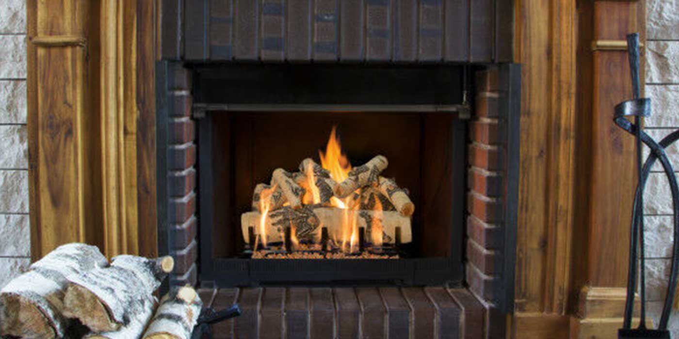 White Fireplace with Real Fyre Gas Logs