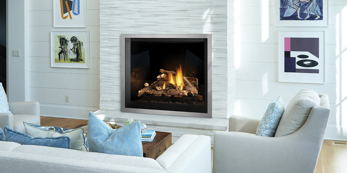 A contemporary living room with a large square Direct Vent gas fireplace and log set