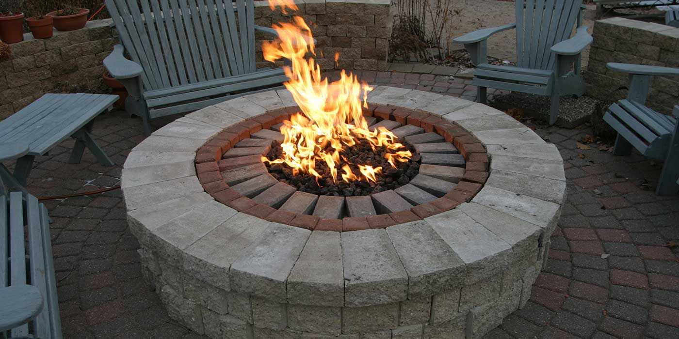 An outdoor DIY gas fire pit with a powerful burner system