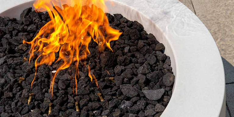 An HPC burner system covered by lava rock fire media