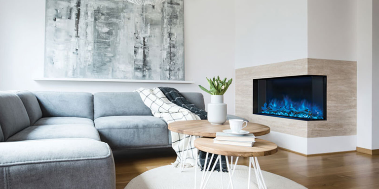 A modern living room with a multi-sided Modern Flames electric fireplace