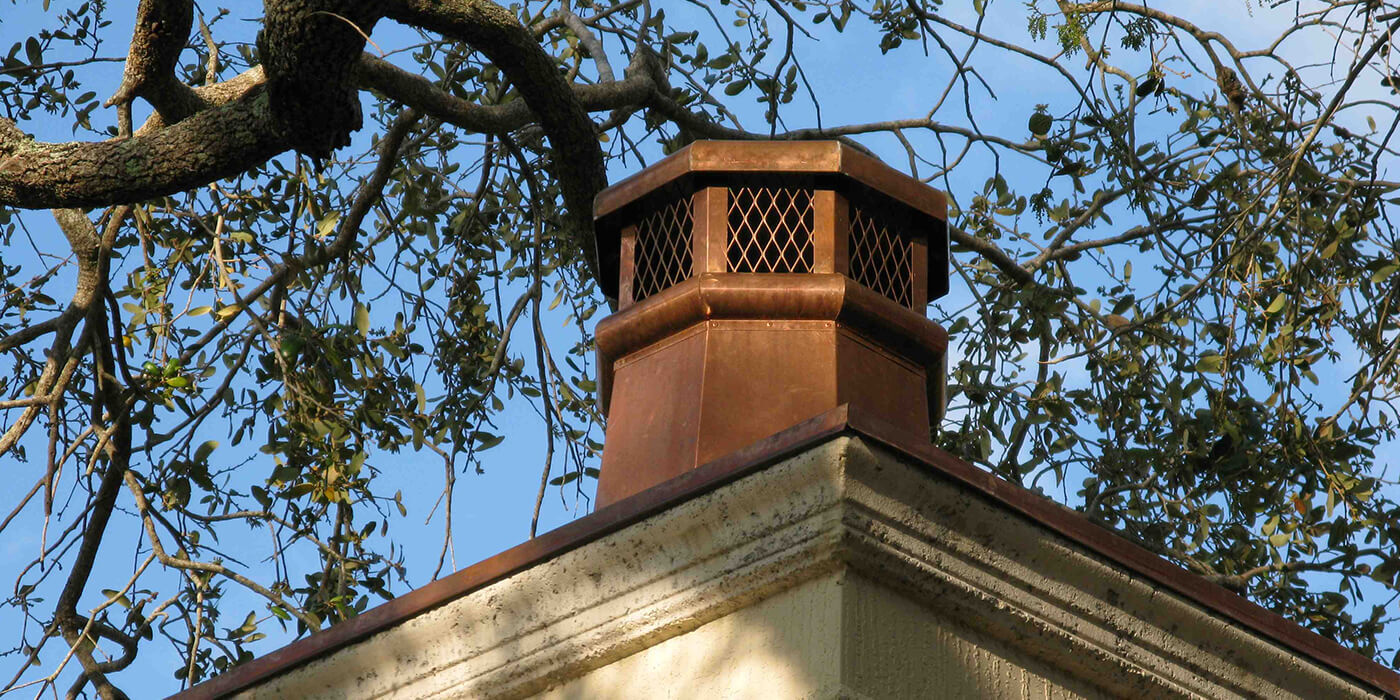 A decorative metal chimney cap
