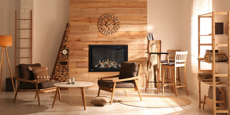 A rustic indoor living space with a traditional gas fireplace