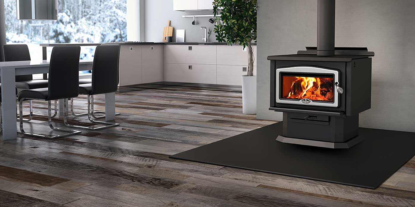A contemporary dining space with a traditional wood burning stove