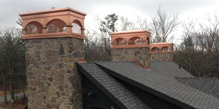 Three custom copper chimney shrouds by American Chimney Shroud