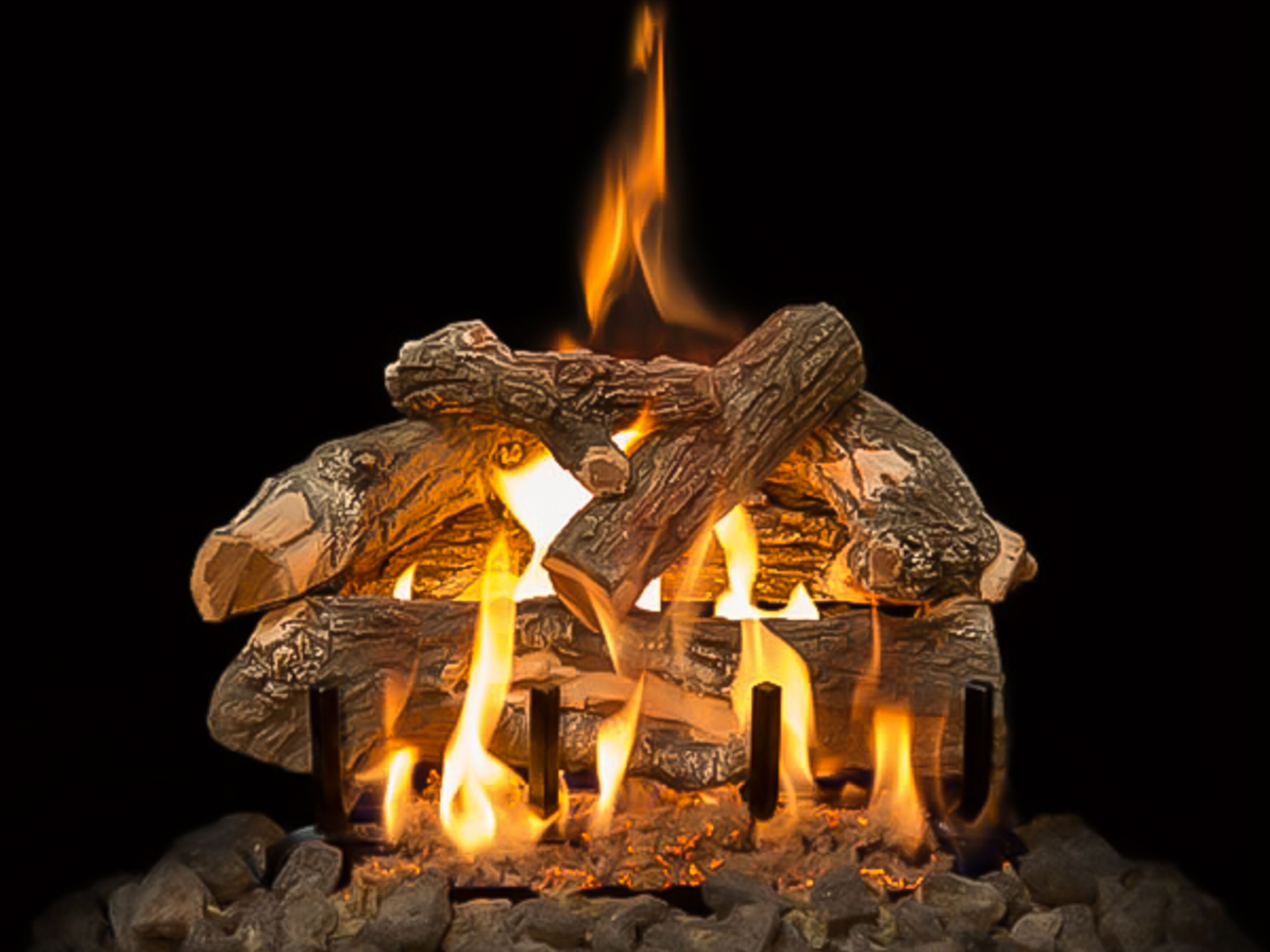 The Weathered Oak gas log set from Grand Canyon Gas Logs is cast from real wood found in the Arizona wilderness and features a hand-painted, textured bark finish and authentic splitting. 