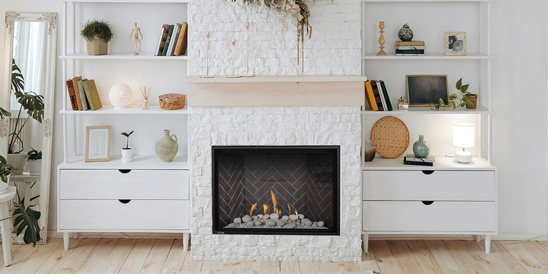 A contemporary fireplace hearth with a traditional square gas fireplace 