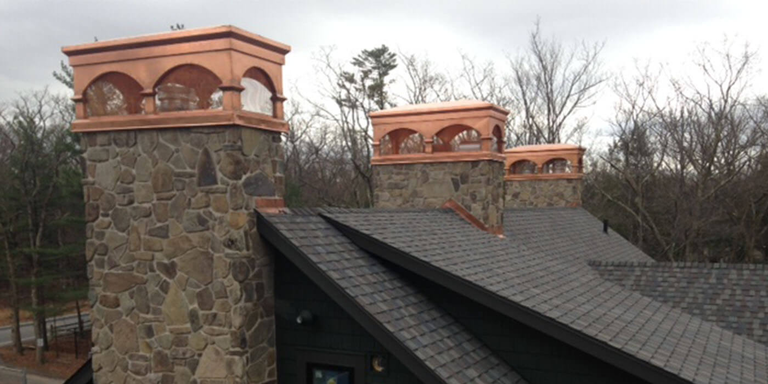 Three copper chimney shrouds 