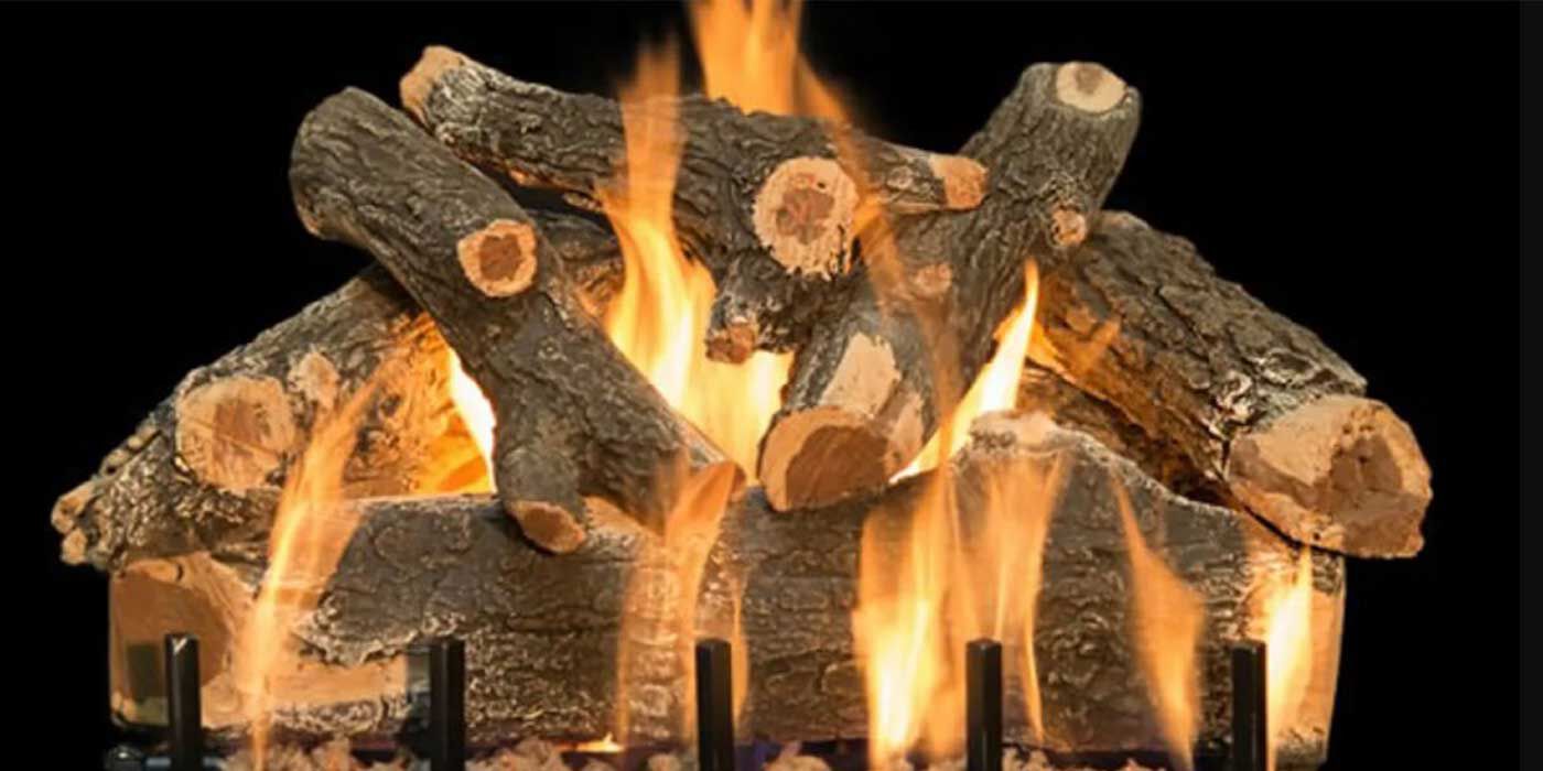 A stack of Vented Arizona Weathered Oak gas logs with rustic bulges, knobs, and cracks on a black background. 