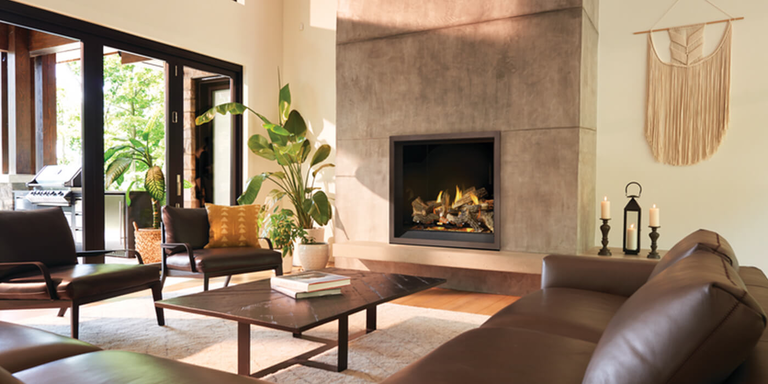 A mid century modern living space with a classic square shaped Direct Vent gas fireplace with a realistic log set that looks like a real wood burning fire