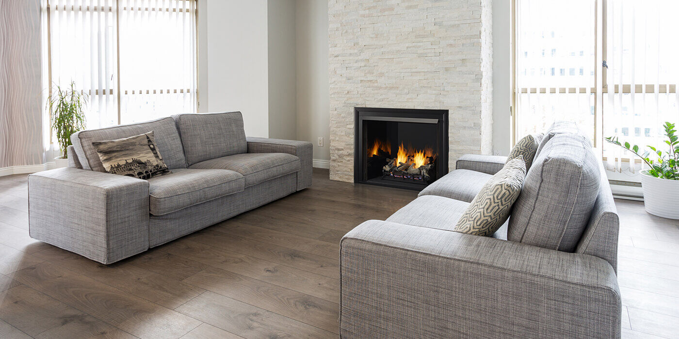 A contemporary living room with a gas fireplace insert
