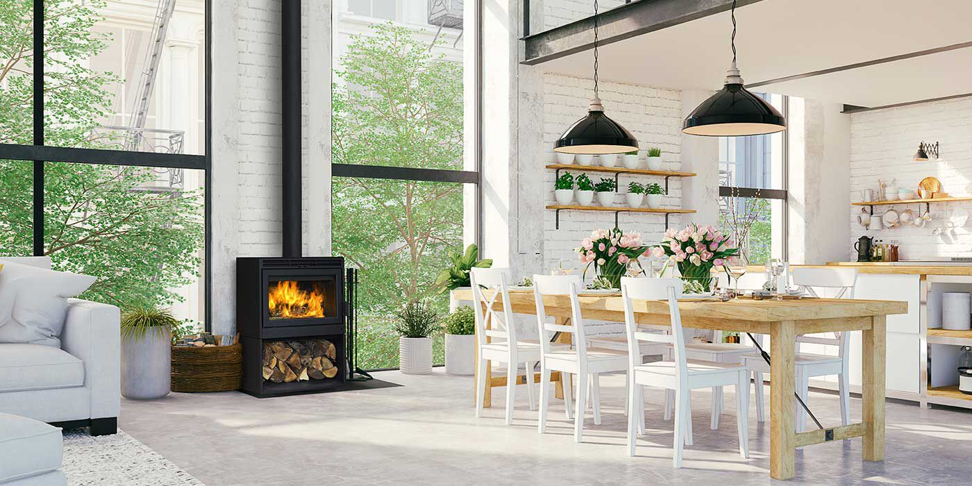 A contemporary dining room with a large wood burning stove