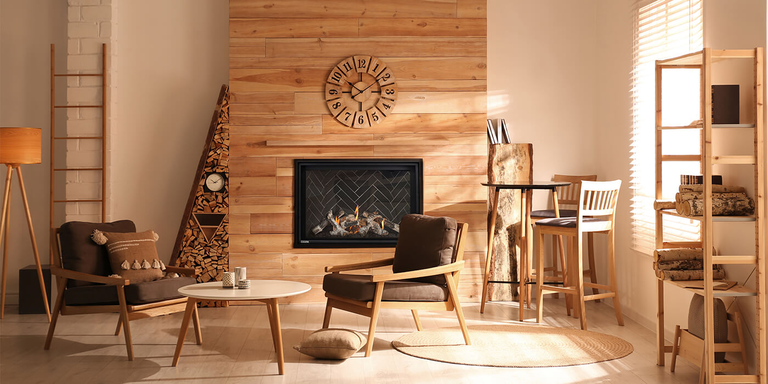 A rustic indoor living space with a traditional-looking rectangular Direct Vent gas fireplace