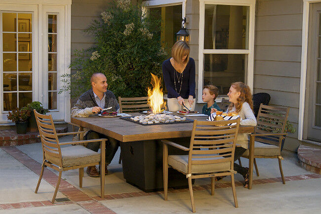 Family Dining at a Fire Table