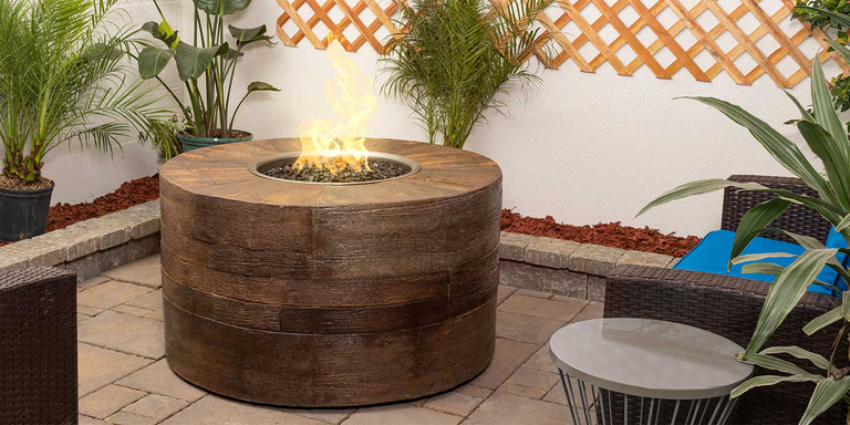 A Propane gas fire pit with a woodgrain finish that can store a 20-lb. Propane tank.