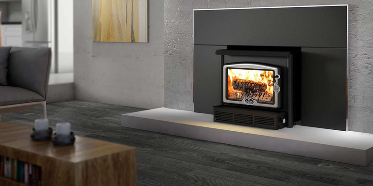 An industrial living room with a contemporary wood stove insert