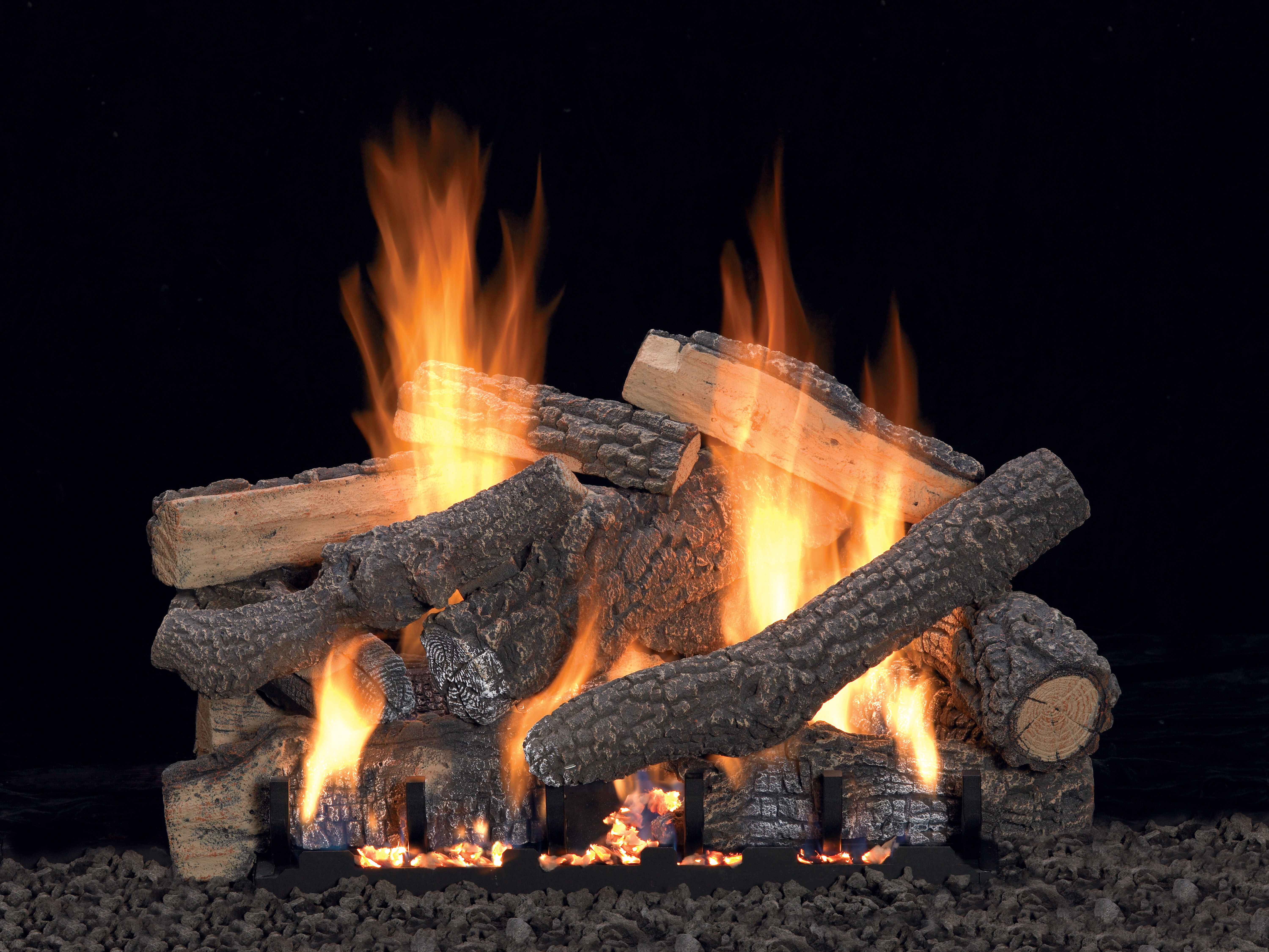 The Ponderosa gas log set by Empire features a hand-painted finish with unique twists, knobs, and cracks, along with split pieces to look like freshly cut firewood. 