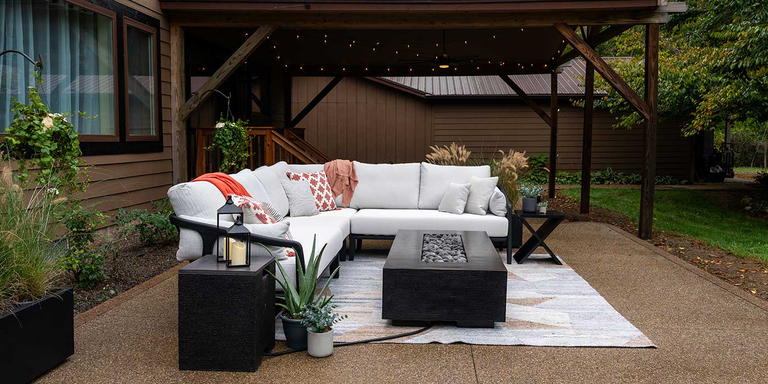 The FlameCraft Zen gas fire pit and a matching Propane tank enclosure installed on an outdoor patio