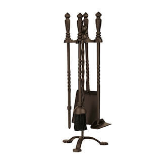 The four-piece bronze fireplace tool set from Northern Flame