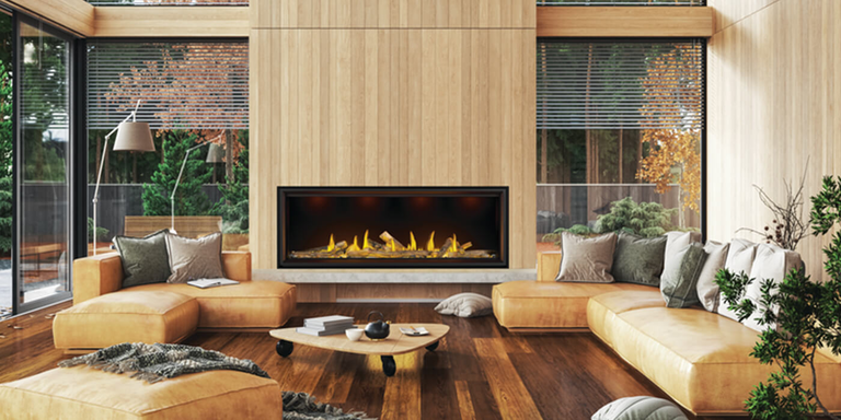 A mid-century modern living space with a large, linear gas fireplace