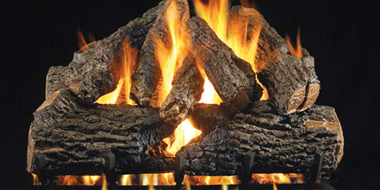 A rustic, Vented gas log set with orange and yellow flames, a glowing ember bed, and a traditional black fireplace grate.