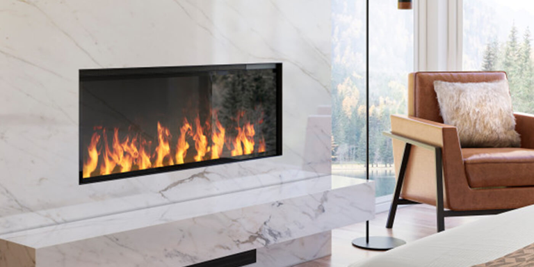 A linear electric fireplace recessed into a marble surround 