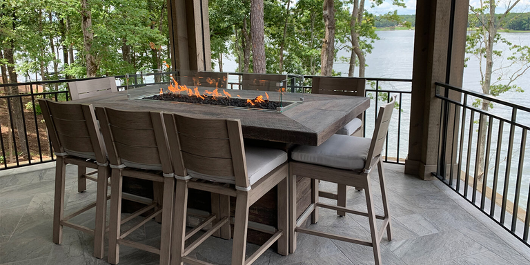 An outdoor gas fire pit dining table 