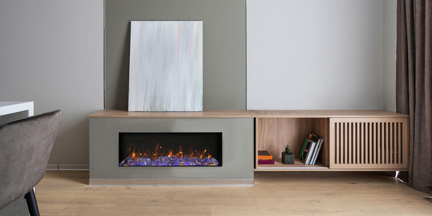 A linear electric fireplace integrated into a custom shelving unit