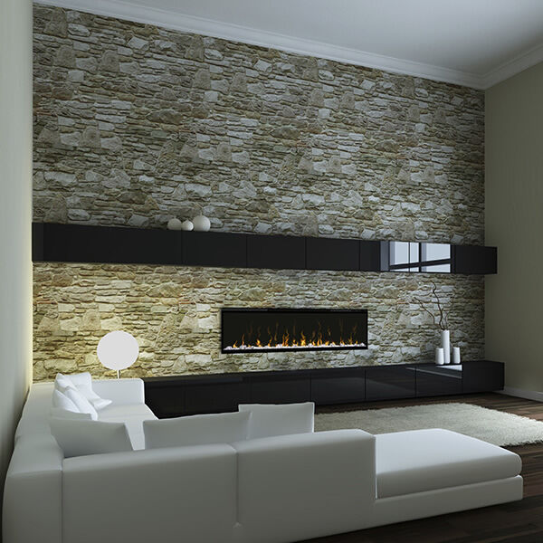The Dimplex IgniteXL electric fireplace installed on a stone accent wall with a modern, black fireplace mantel. 