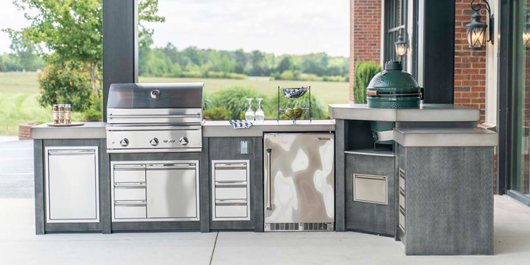 A gray and stainless steel modular outdoor kitchen island 