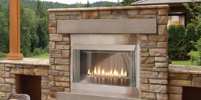 An outdoor gas fireplace