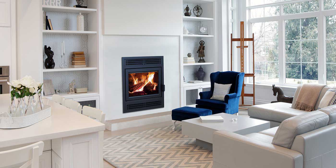 A contemporary living room with a Supreme Astra wood burning stove insert
