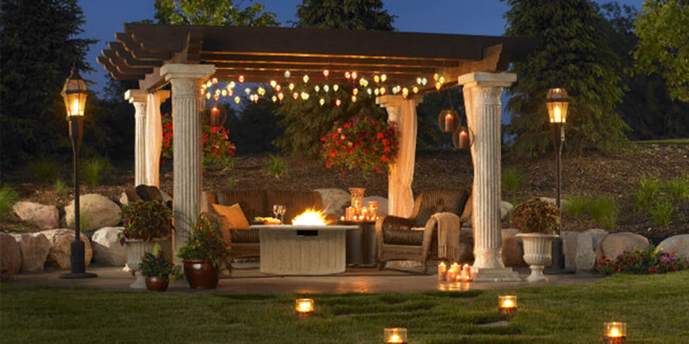 Backyard patio with gas fire pit and pergola