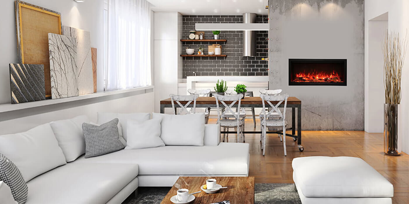 A contemporary indoor living and dining space with a linear electric fireplace 
