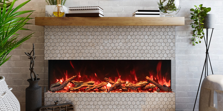A close-up view of a realistic electric fireplace with natural-looking orange flames and a driftwood log set