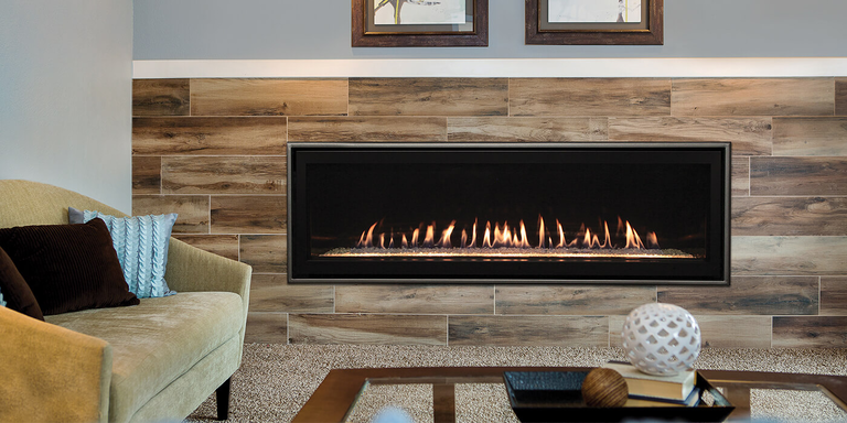 A modern indoor space with a linear gas fireplace