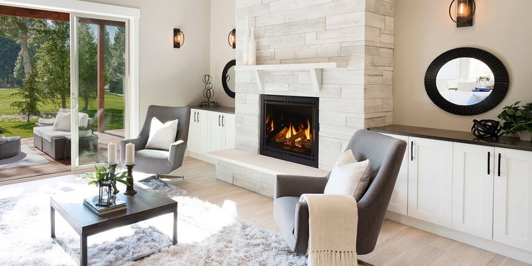 A contemporary living space with a square gas fireplace and a white floating mantel