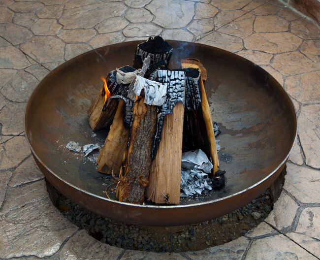 Logs and kindling for wood burning fire pit