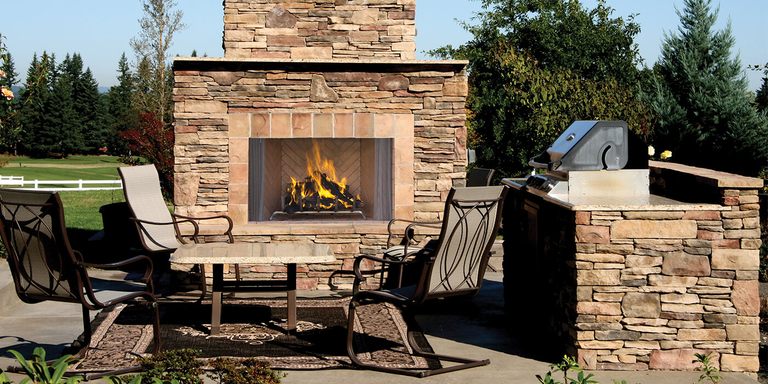A traditional outdoor wood fireplace 