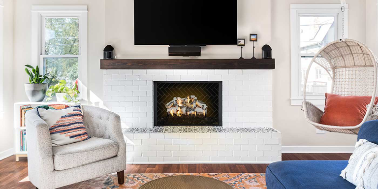 A close-up view of a realistic gas log set with hand-painted detailing and unique twists, cracks, knobs, and splits for extra authenticity.