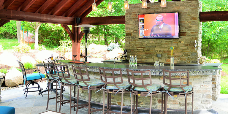 An outdoor bar area with seating