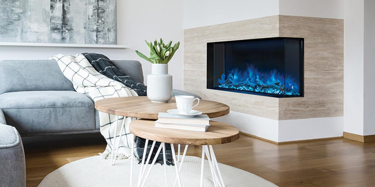 A modern living room with a Modern Flames two-sided electric fireplace