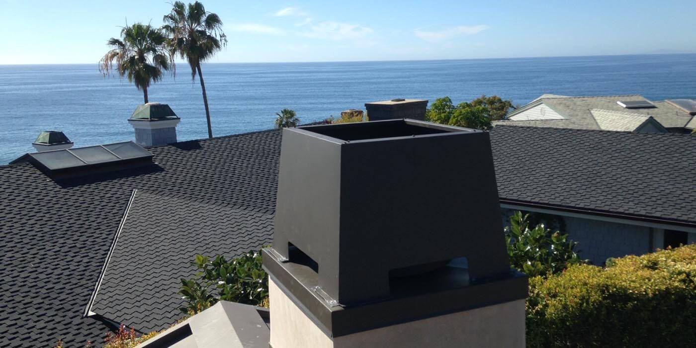 A black kynar-coated steel chimney shroud by American Chimney Shroud