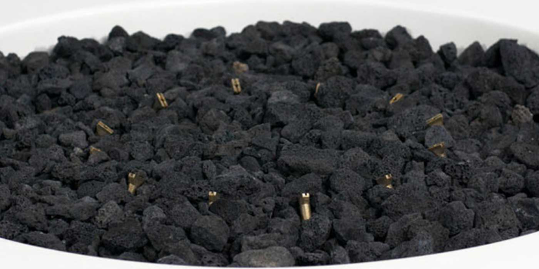 A close-up view of an HPC Torpedo fire pit burner 