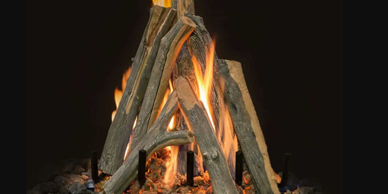 Vented Juniper-style gas logs stacked in a tee-pee style position on a black background.