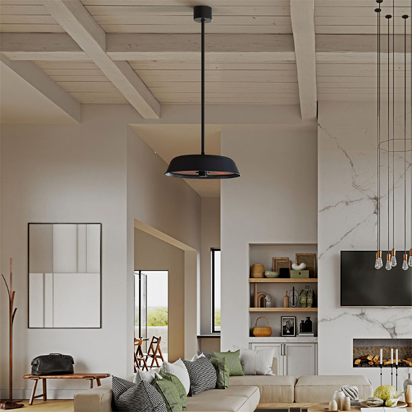 An enclosed patio space with a lounging area, fireplace, and Solaira Radius pendant style patio heater mounted to the ceiling