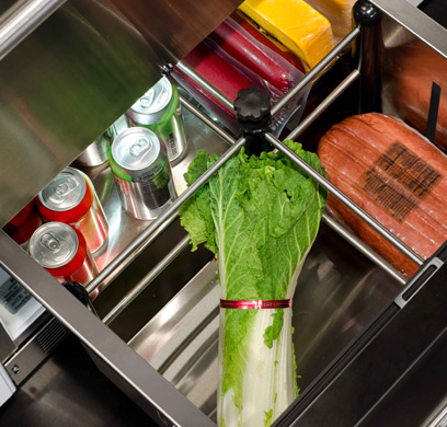 An outdoor refrigerator drawer stocked with ingredients 